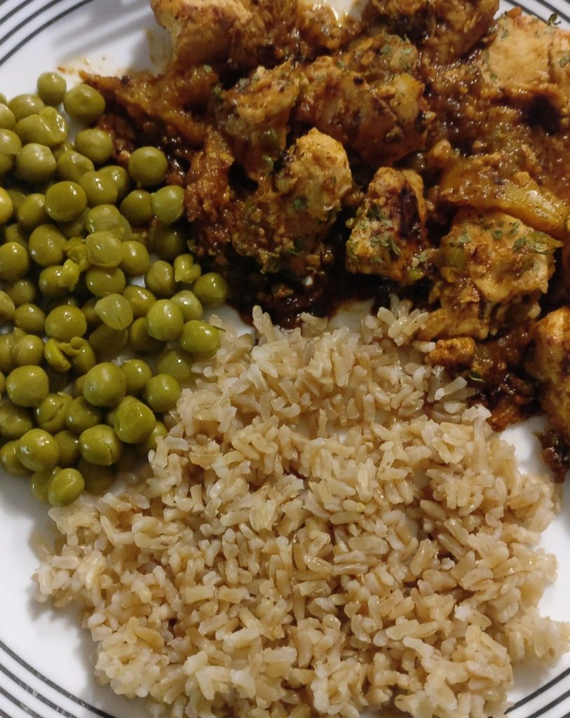 Sweet and Spicy Glazed Chicken with peas and rice