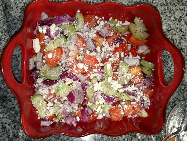 Greek Cucumber Salad in Red Ceramic Bowl- Cucumber, Red Onion, Tomato, and Feta Cheese