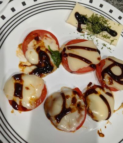 Anthracite Salad Tomatoes and Cheese Plated