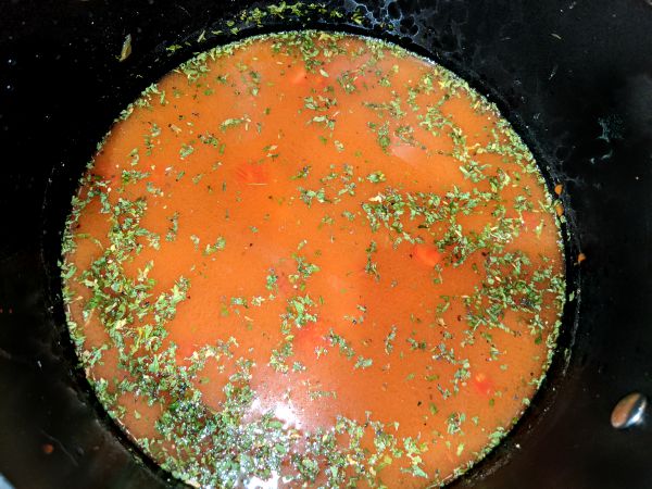 Tomato Based Broth with Chopped Tomatoes and Herbs