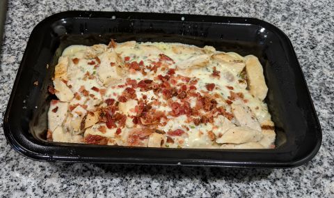 Chicken Carbonara with Spaghetti, Cooked, Topped with Bacon, sitting on counter