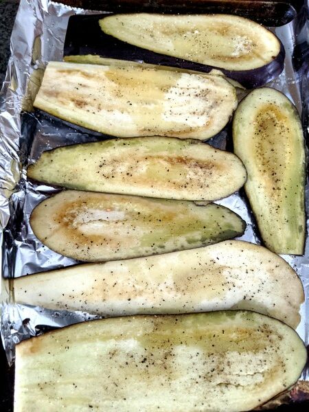 Eggplants sliced before baking