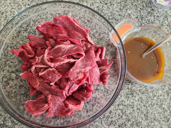 Beef Sirloin Steak in bowl with marinade