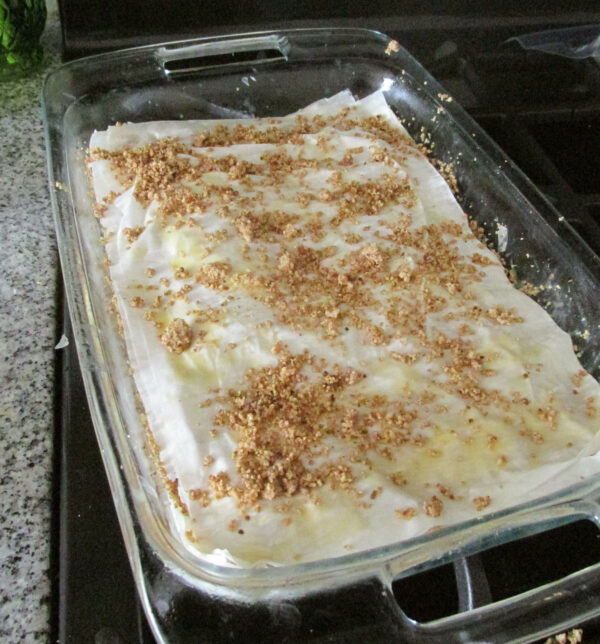 Baklava layering, dough with crushed nuts