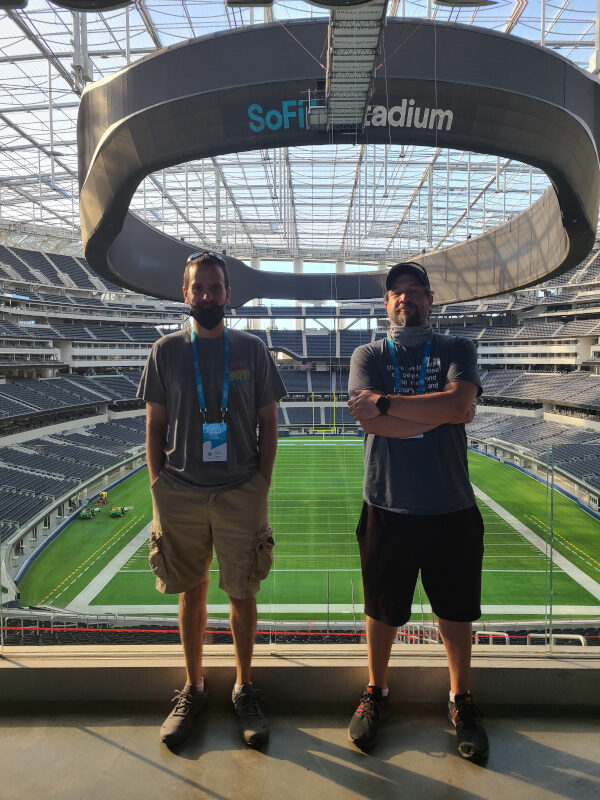 SoFi Stadium - Inglewood California, two men near endzone in concourse