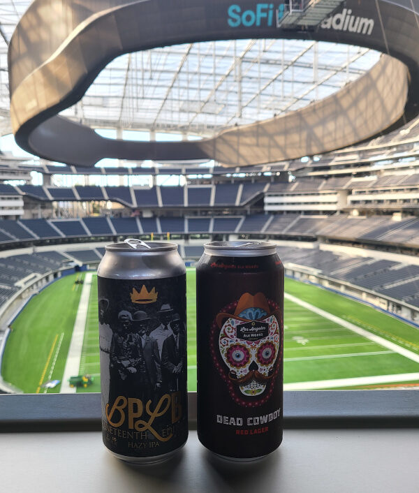 SoFi Stadium - Inglewood California. Two beers on ledge overlooking field.