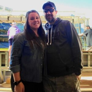 Couple inside dugout during Petco Park Tour