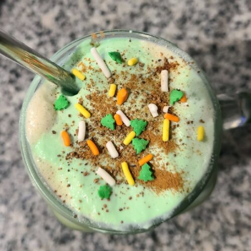 Bailey's Infused Whipped Cream with sprinkles on top of Irish Coffee