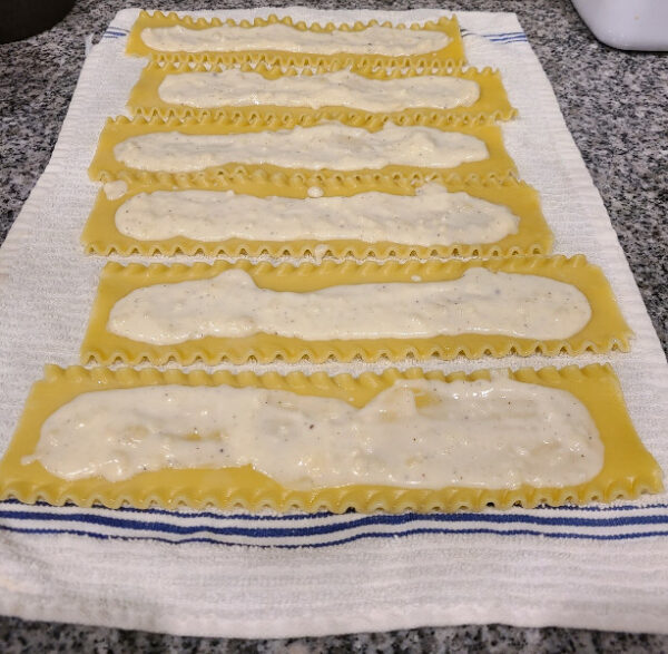 Making Nidi di Rondine - Bechamel on lasagna Noodles