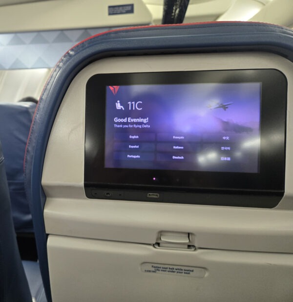 Sitting in seat 11C on our way to 30 Hours in San Francisco